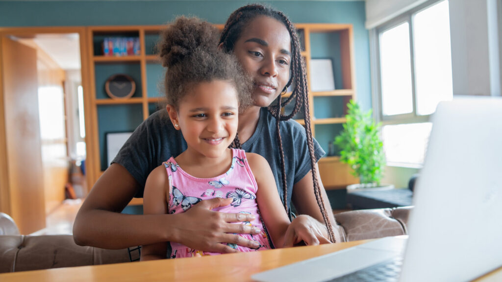 Mother and daughter on a video call with a doctor for a online medical consult