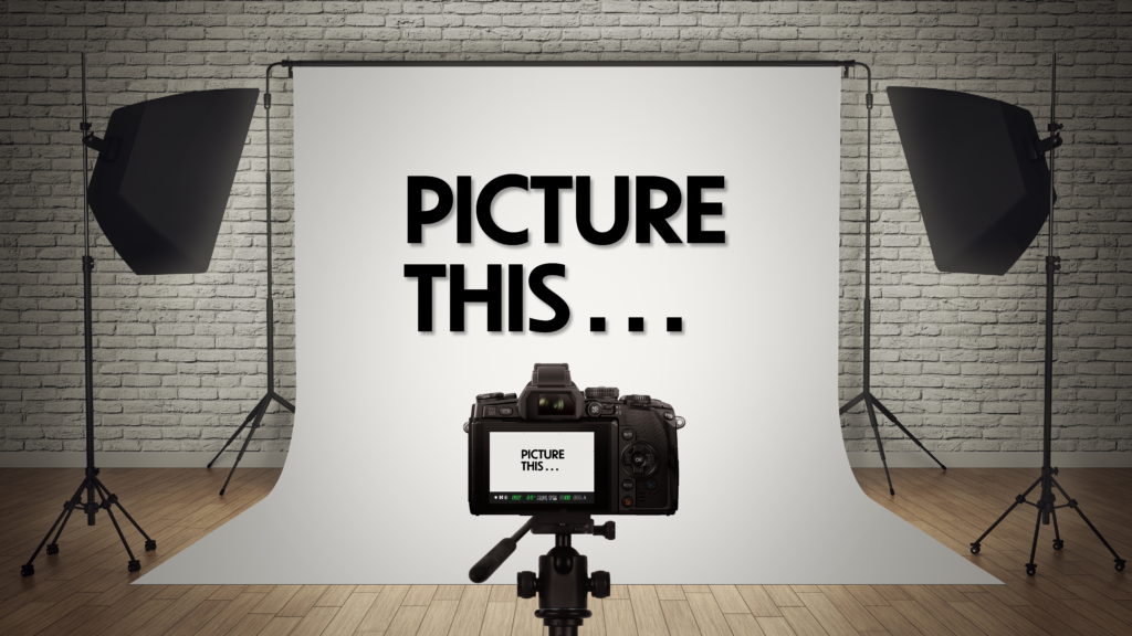 photography studio with camera focused on lighted screen reading 'picture this'