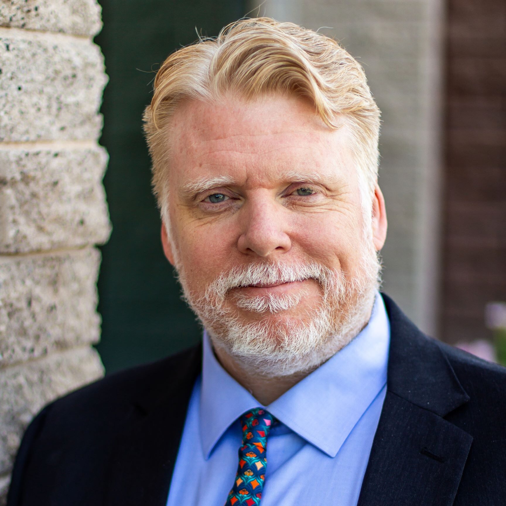 headshot of Christopher Tiffany, executive director of Raising Special Kids