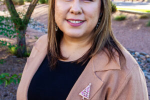 headshot of Viviana Sexton outside smiling at the camera