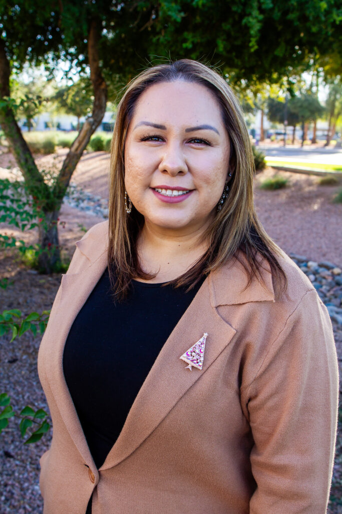 headshot of Viviana Sexton outside smiling at the camera