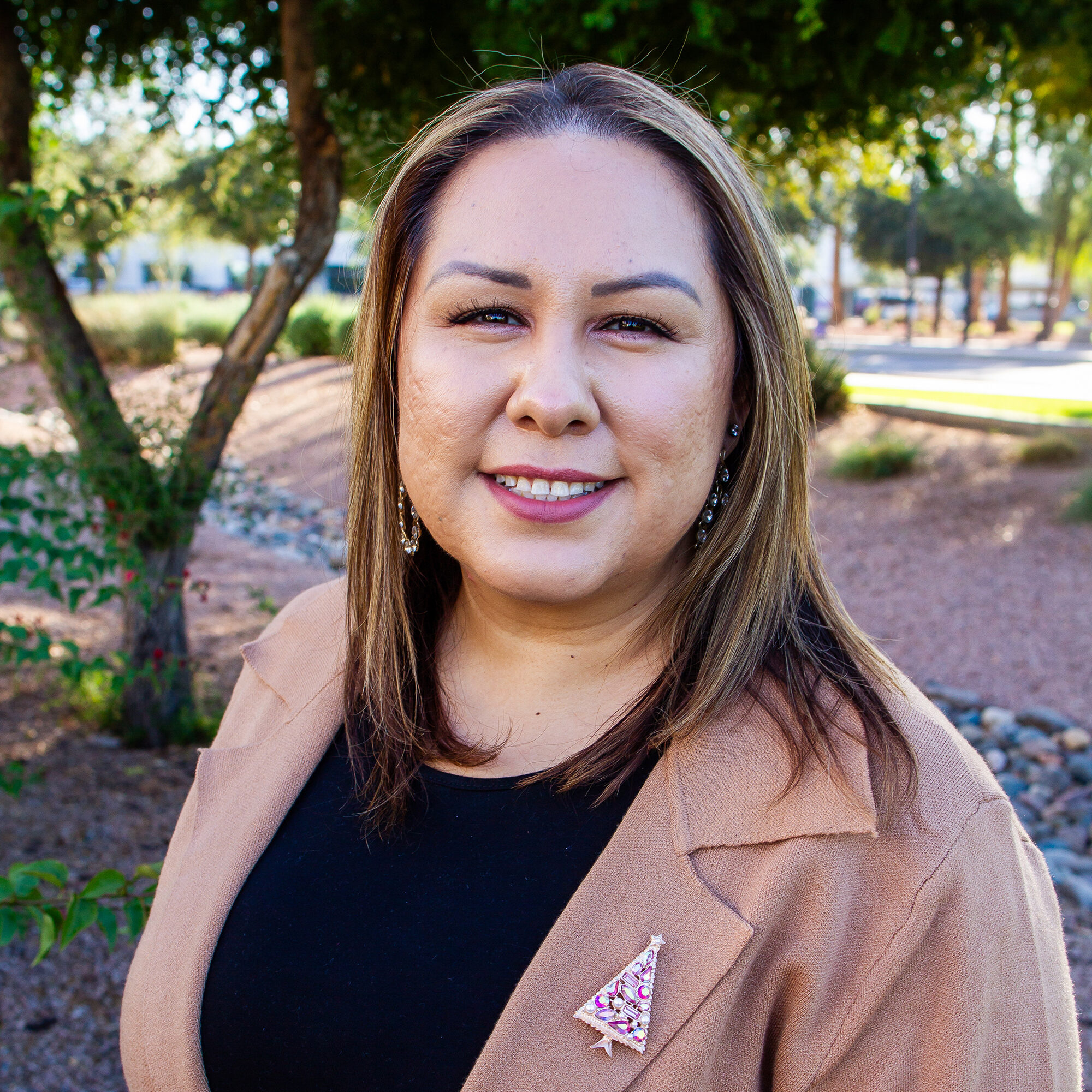 headshot of Viviana Sexton outside smiling at the camera