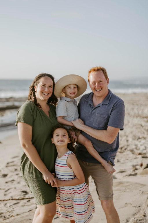 Dave Taylor and his family on a beach